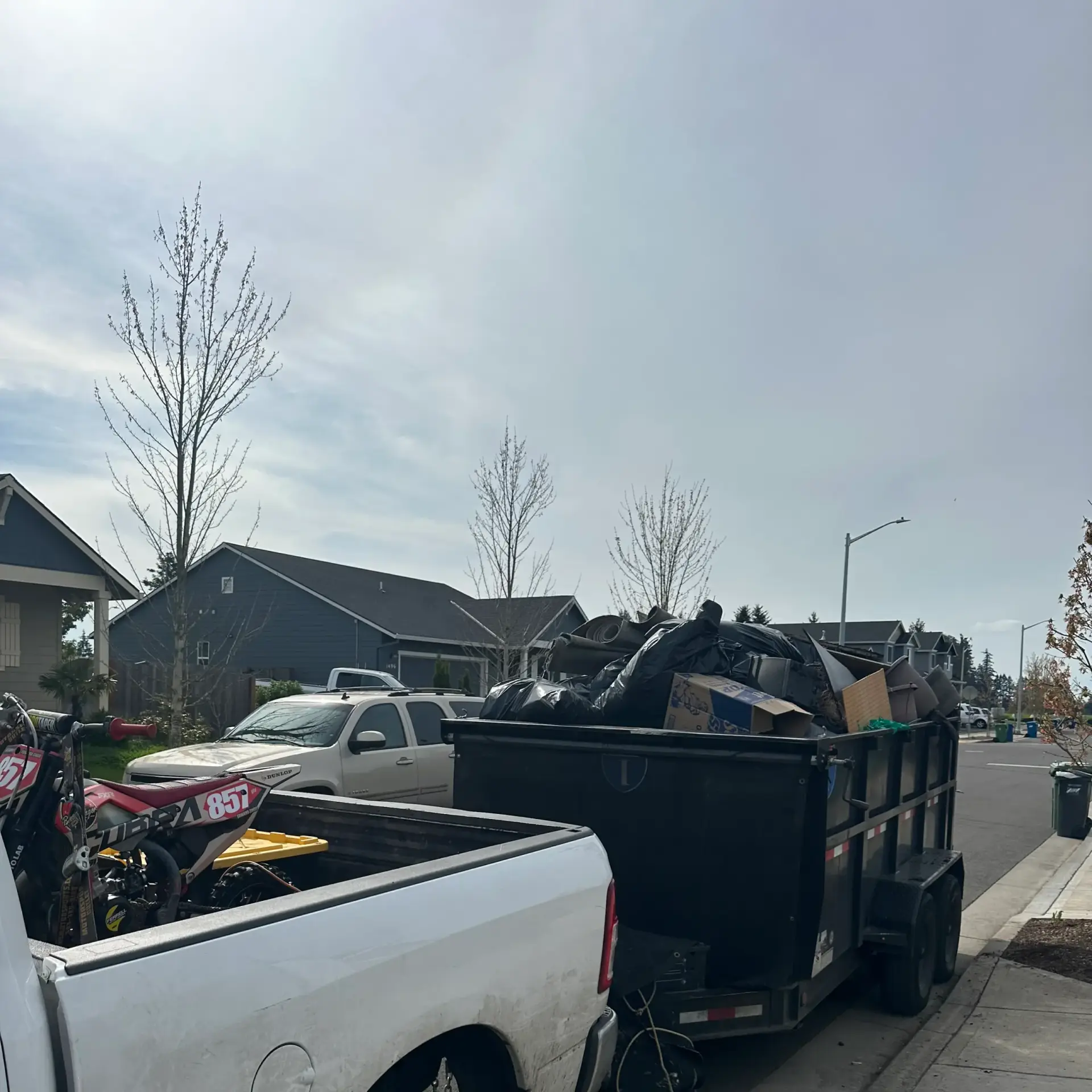 Yard waste removal Salem Oregon crew clearing storm debris